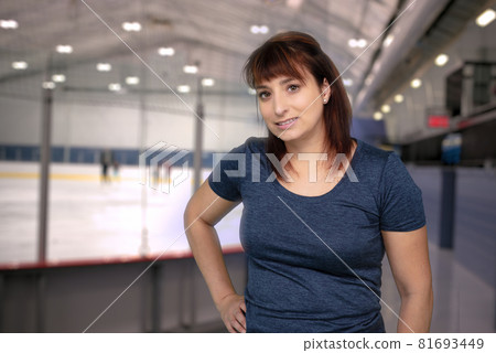 woman hockey player at the arena indoor winter sport active people in their thirties woman hockey player at the arena indoor winter sport active people in their thirties 81693449