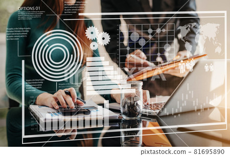 Business Corporate team brainstorming, Planning Strategy having a discussion Analysis investment researching with chart at office desk documents in office. 81695890