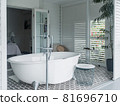 View of a spacious and elegant bathroom. 81696710