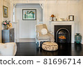 Big and comfortable living room with bright sofa 81696714