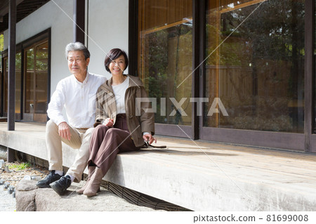 Senior couple trip A good couple who talks about memories that came on the porch Senior couple trip A good couple who talks about memories that came on the porch 81699008