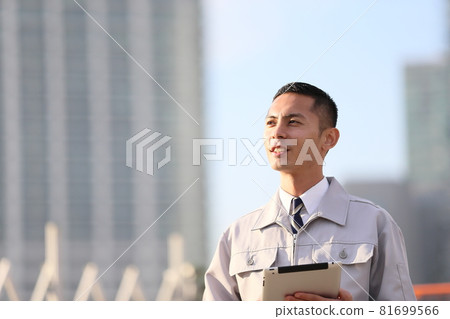 Uniform clock, office worker, new employee, worker, business, outdoor, young man, building, corona, sales copy space Uniform clock, office worker, new employee, worker, business, outdoor, young man, building, corona, sales copy space 81699566