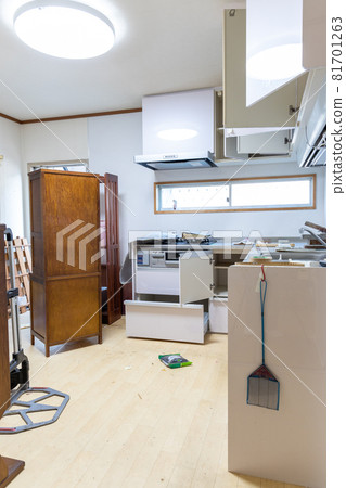The kitchen of an old house that is being organized before demolition 81701263