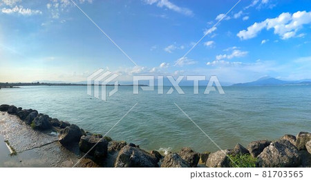 water of lake garda in italy surrounded by mountains 81703565