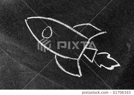 White color chalk hand drawing in rocket shape on blackboard or chalkboard background (Concept for new experience, start up the business) White color chalk hand drawing in rocket shape on blackboard or chalkboard background (Concept for new experience, start up the business) 81706383