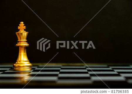 Gold king chess piece stand on black background with copy space (Concept for leadership, unique) Gold king chess piece stand on black background with copy space (Concept for leadership, unique) 81706385