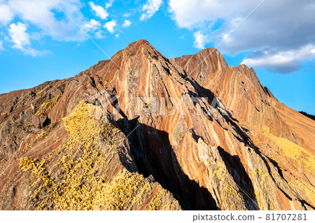 Pallay Punchu of Apu Takllo Rainbow Mountains in Peru Pallay Punchu of Apu Takllo Rainbow Mountains in Peru 81707281