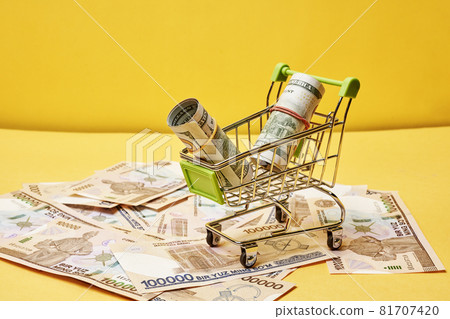 Buying us dollars in Uzbekistan. US dollars roll in shopping trolley and pile of Uzbek sums. Uzbek money and us dollar money exchange Buying us dollars in Uzbekistan. US dollars roll in shopping trolley and pile of Uzbek sums. Uzbek money and us dollar money exchange 81707420
