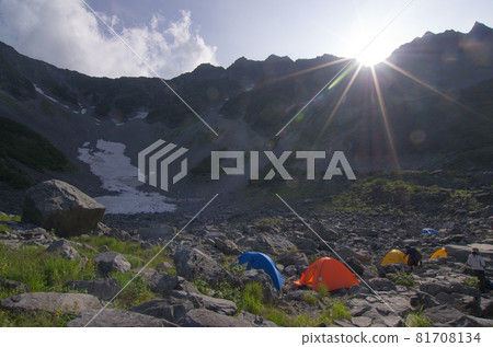 Tents at Karasawa Cirque on the route to Okuhotakadake, one of Japan's 100 famous mountains, in summer from Kamikochi in the Japanese Alps in Matsumoto City, Nagano Prefecture Tents at Karasawa Cirque on the route to Okuhotakadake, one of Japan's 100 famous mountains, in summer from Kamikochi in the Japanese Alps in Matsumoto City, Nagano Prefecture 81708134