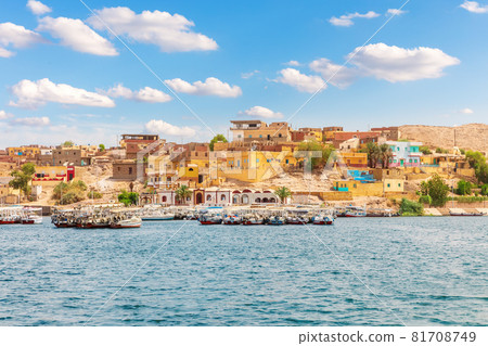 Egyptian village by the Philae Temple, view from the Nile, Aswan 81708749