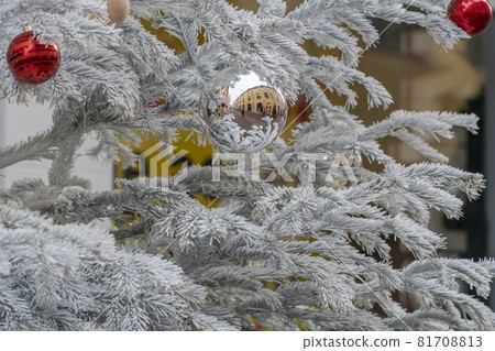 reflection of street and buildings on the ball of noel tree reflection of street and buildings on the ball of noel tree 81708813