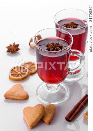Hot red mulled wine isolated on white background with christmas spices 81708864