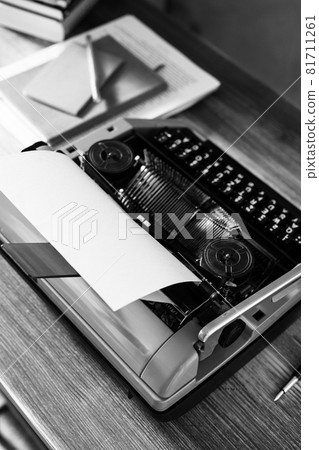 Vintage old typewriter at wooden desk table. Writer creative concept 81711261