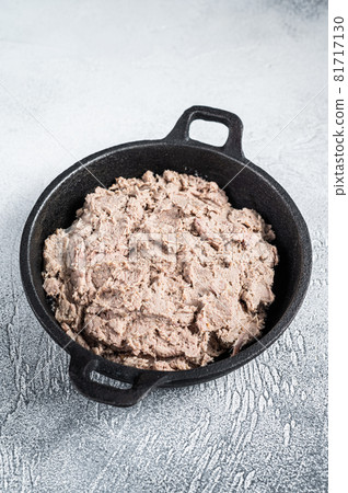 Duck pate Rillettes de Canard in a pan. White background. Top View. Copy space 81717130
