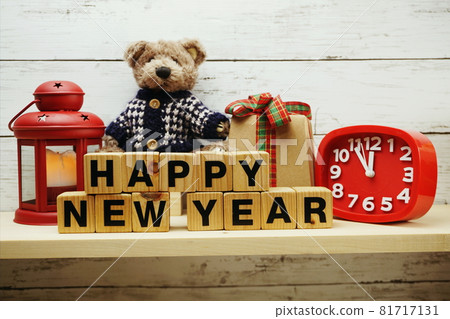 hapy new year alphabet letters on wooden background hapy new year alphabet letters on wooden background 81717131