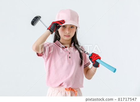 Portrait close up isolated studio shot of Asian little professional girl kid golfer in pink athlete fashion clothing red gloves and cap stand look at camera touch brim and put putter across shoulder Portrait close up isolated studio shot of Asian little professional girl kid golfer in pink athlete fashion clothing red gloves and cap stand look at camera touch brim and put putter across shoulder 81717547
