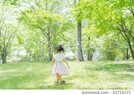 Photo of a girl walking in the woods 81718275