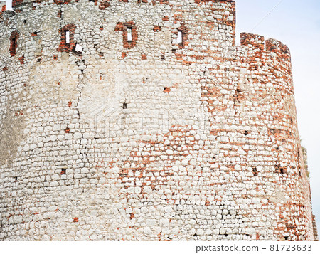 Main palace wall built from white limestone and red bricks. 81723633