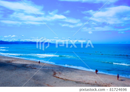Relaxing on the beach under the blue sky and looking out to the horizon Relaxing on the beach under the blue sky and looking out to the horizon 81724696