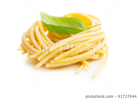 Italian pasta nest. Uncooked spaghetti nest. 81727044