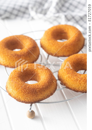 Round sponge cake dessert. Sweet donut. 81727059