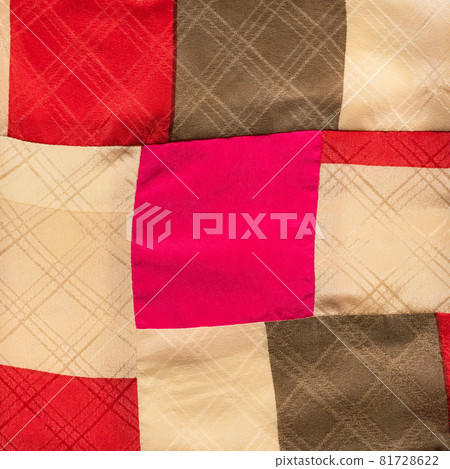 textile background - square ornament on hand-sewn patchwork cloth textile background - square ornament on hand-sewn patchwork cloth 81728622