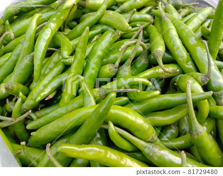 hot and spice chili pepper on basket in shop hot and spice chili pepper on basket in shop 81729480