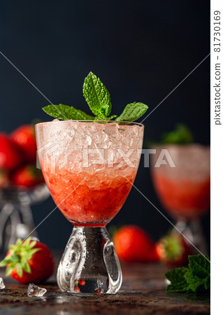 Fresh cocktail with crushed ice, strawberry and mint Fresh cocktail with crushed ice, strawberry and mint 81730169