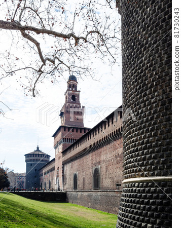 Travel to Italy - view of fortified wall of Castello Sforzesco (Sforza Castle) with towers Torre di Santo Spirito and Torre del Filarete from Torre del Carmine tower in Milan city in spring Travel to Italy - view of fortified wall of Castello Sforzesco (Sforza Castle) with towers Torre di Santo Spirito and Torre del Filarete from Torre del Carmine tower in Milan city in spring 81730243