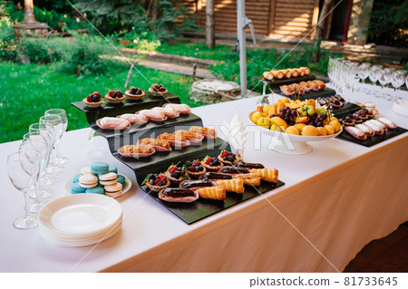 assorted cakes for the holiday. candy bar. sweet birthday treats. assorted cakes for the holiday. candy bar. sweet birthday treats. 81733645