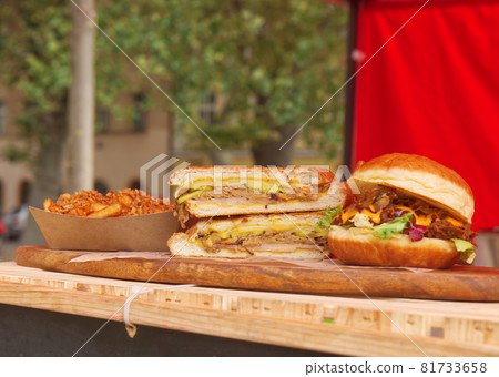 Prague farmers street food market at Karlin. Tasty burgers on offer at the farmers market in Prague, Karlin district 81733658