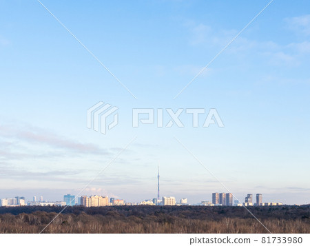 blue sky over city park and residential district on horizon on sunny winter day blue sky over city park and residential district on horizon on sunny winter day 81733980