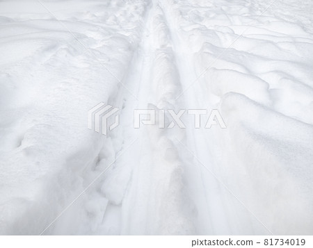 ski track in fresh deep snow close up ski track in fresh deep snow close up 81734019