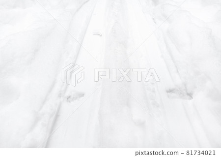 ski tracks in white snowfield close up ski tracks in white snowfield close up 81734021