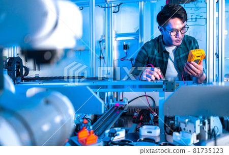 Asian Engineers Maintenance Robot Arm at Lab. they are in a High Tech Research Laboratory with Modern Equipment. Professional Japanese Development Engineer Testing an Artificial Intelligent. Asian Engineers Maintenance Robot Arm at Lab. they are in a High Tech Research Laboratory with Modern Equipment. Professional Japanese Development Engineer Testing an Artificial Intelligent. 81735123