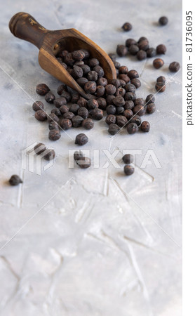 Dry Black chickpea on the wooden scoop closeup 81736095