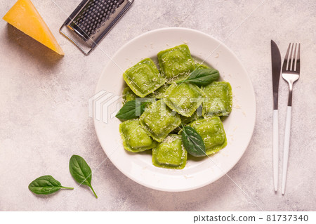 Ravioli with spinach and parmesan. Ravioli with spinach and parmesan. 81737340