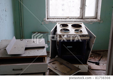 Destroyed electric stove in the kitchen. A room in an abandoned house in the Chernobyl exclusion zone. Destroyed electric stove in the kitchen. A room in an abandoned house in the Chernobyl exclusion zone. 81738308