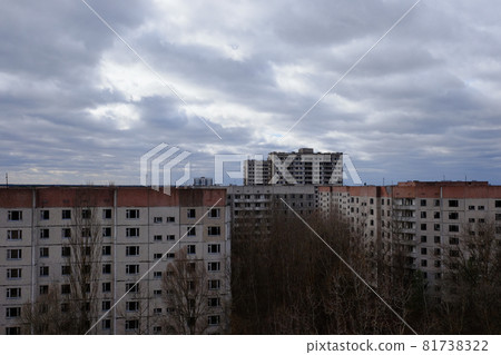 Cloudy sky over abandoned residential buildings in Pripyat. Cloudy sky over abandoned residential buildings in Pripyat. 81738322