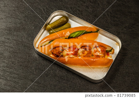 Meatball hot dog sandwich outdoors 81739085