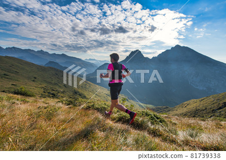 Sporty mountain man rides in trail during endurance training Sporty mountain man rides in trail during endurance training 81739338