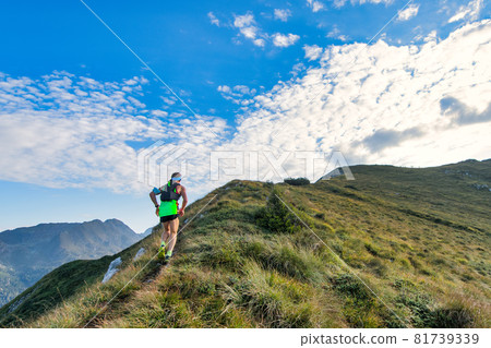 Sporty mountain man rides in trail during endurance race Sporty mountain man rides in trail during endurance race 81739339
