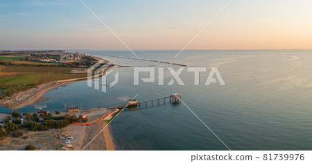 Landscape view of fishing huts 81739976