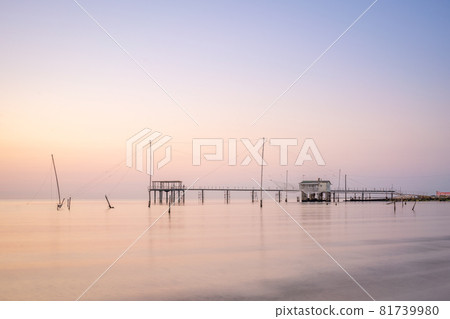 Minimalist view of the fishing huts at dawn 81739980