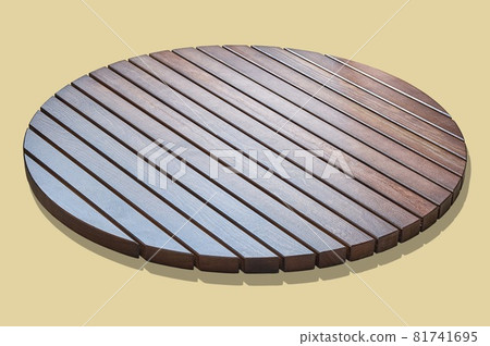 Round table top of wooden slats on beige background 81741695