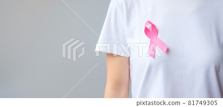 October Breast Cancer Awareness month, elderly Woman in white T- shirt with Pink Ribbon for supporting people living and illness. International Women, Mother and World cancer day concept 81749305