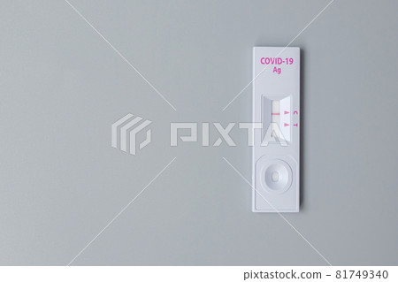 Rapid Antigen Test kit with Negative result during swab COVID-19 testing. Coronavirus Self nasal or Home test, Lockdown and Home Isolation concept Rapid Antigen Test kit with Negative result during swab COVID-19 testing. Coronavirus Self nasal or Home test, Lockdown and Home Isolation concept 81749340