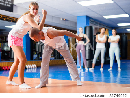 Woman training elbow strike 81749912
