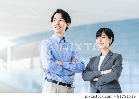 Men and women with their arms crossed in the aisle. Men and women with their arms crossed in the aisle. 81751519
