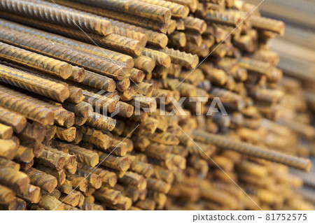 Reinforcing bars with a periodic profile in the packs are stored in the metal products warehouse Reinforcing bars with a periodic profile in the packs are stored in the metal products warehouse 81752575